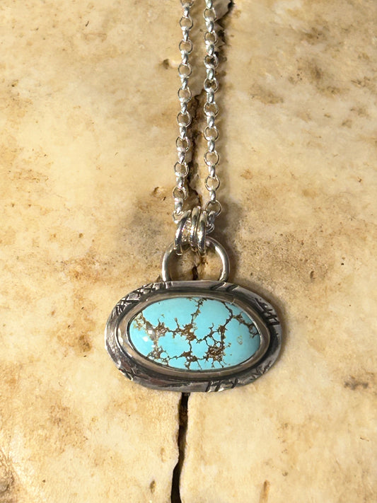 Blue Royston turquoise set in rustic tuff gurlz setting on an 18 inch sterling silver chain.