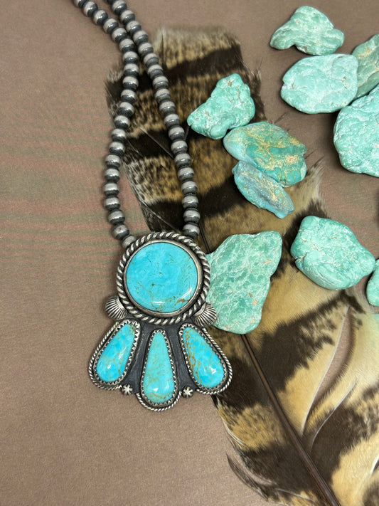 Turquoise necklace with sterling silver accents and a great southwestern feel.