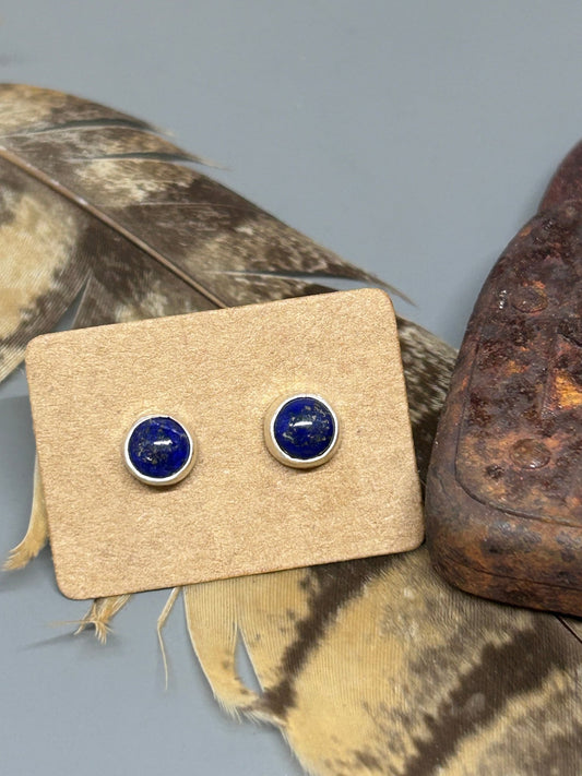 Small Round Lapis cabochons set in sterling silver with sterling ear posts and backs.