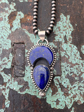 Load image into Gallery viewer, Lapis stones, crescent moon and teardrop shaped, set in sterling silver. The stones are accented with silver bead wire and silver stars.  The pendant is 3 inches long and 1.25 inches wide.
