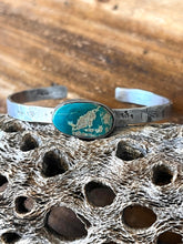 Load image into Gallery viewer, Rustic sterling silver cuff bracelet with Royston turquoise.
