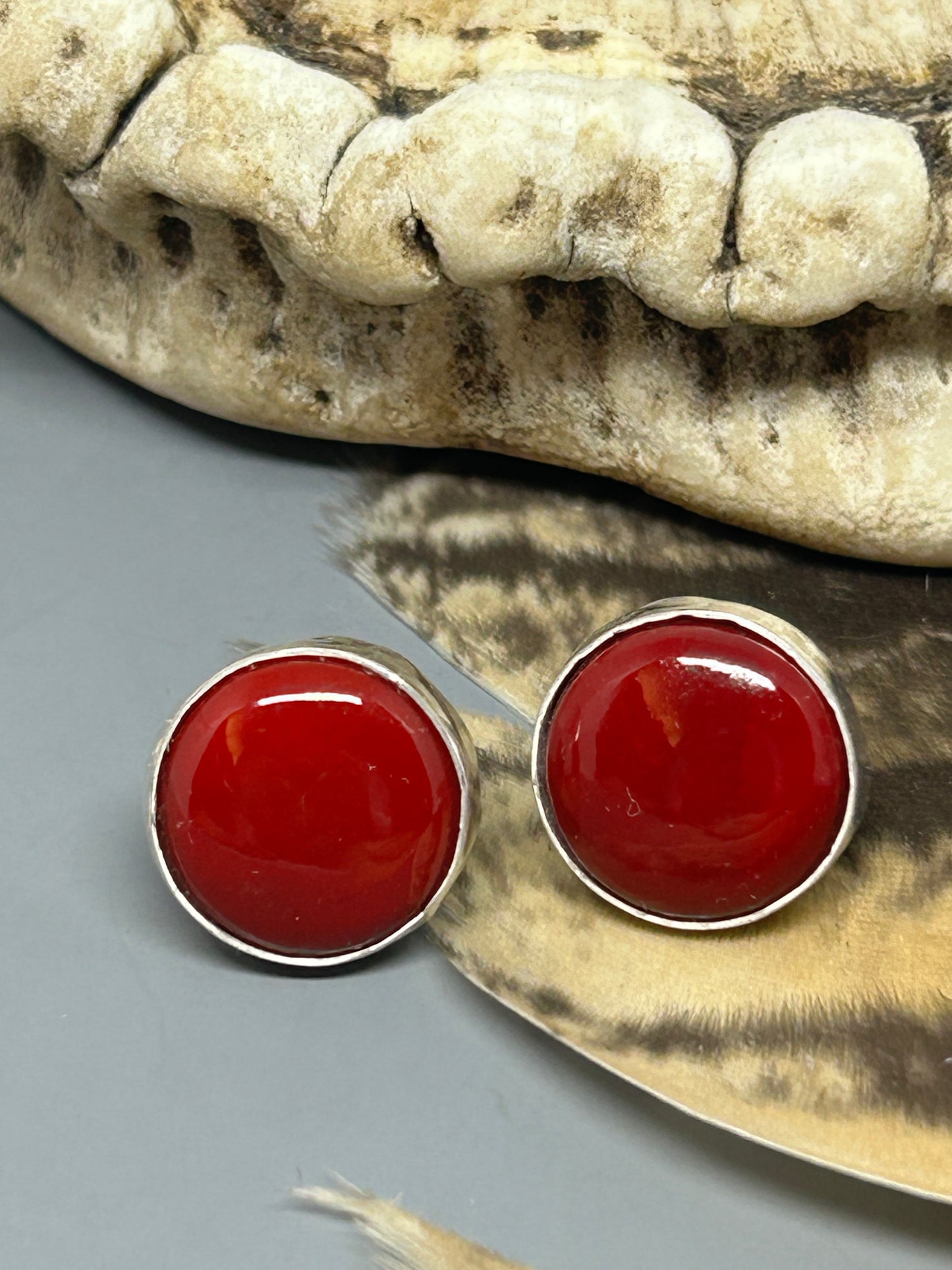 Round Rosarita cabochons set in a polished sterling silver finish with sterling silver ear posts and backs. These earrings are 1/4 of an inch in diameter.