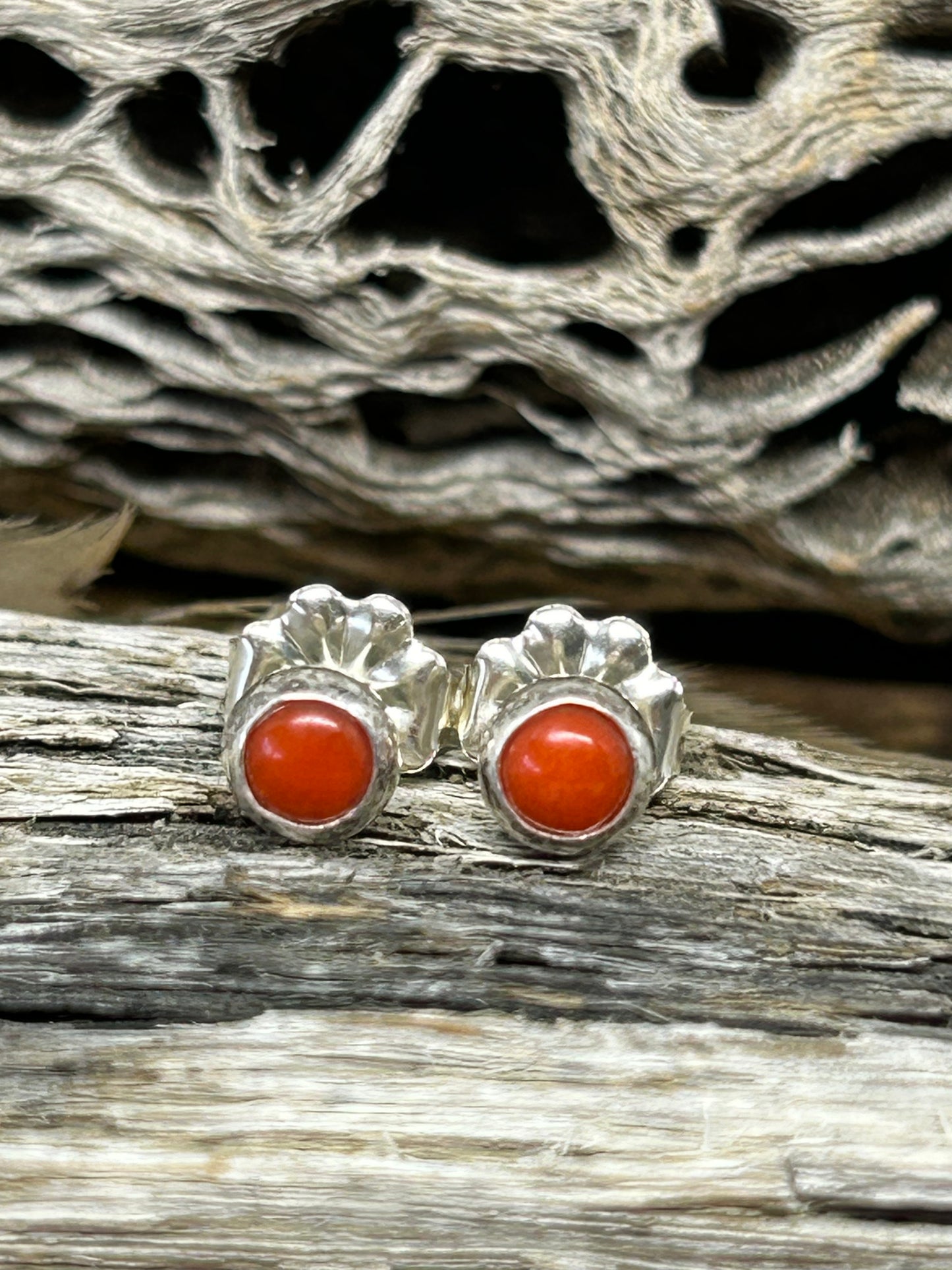 Small round natural Mediterranean coral set in sterling silver with sterling silver posts and backs.