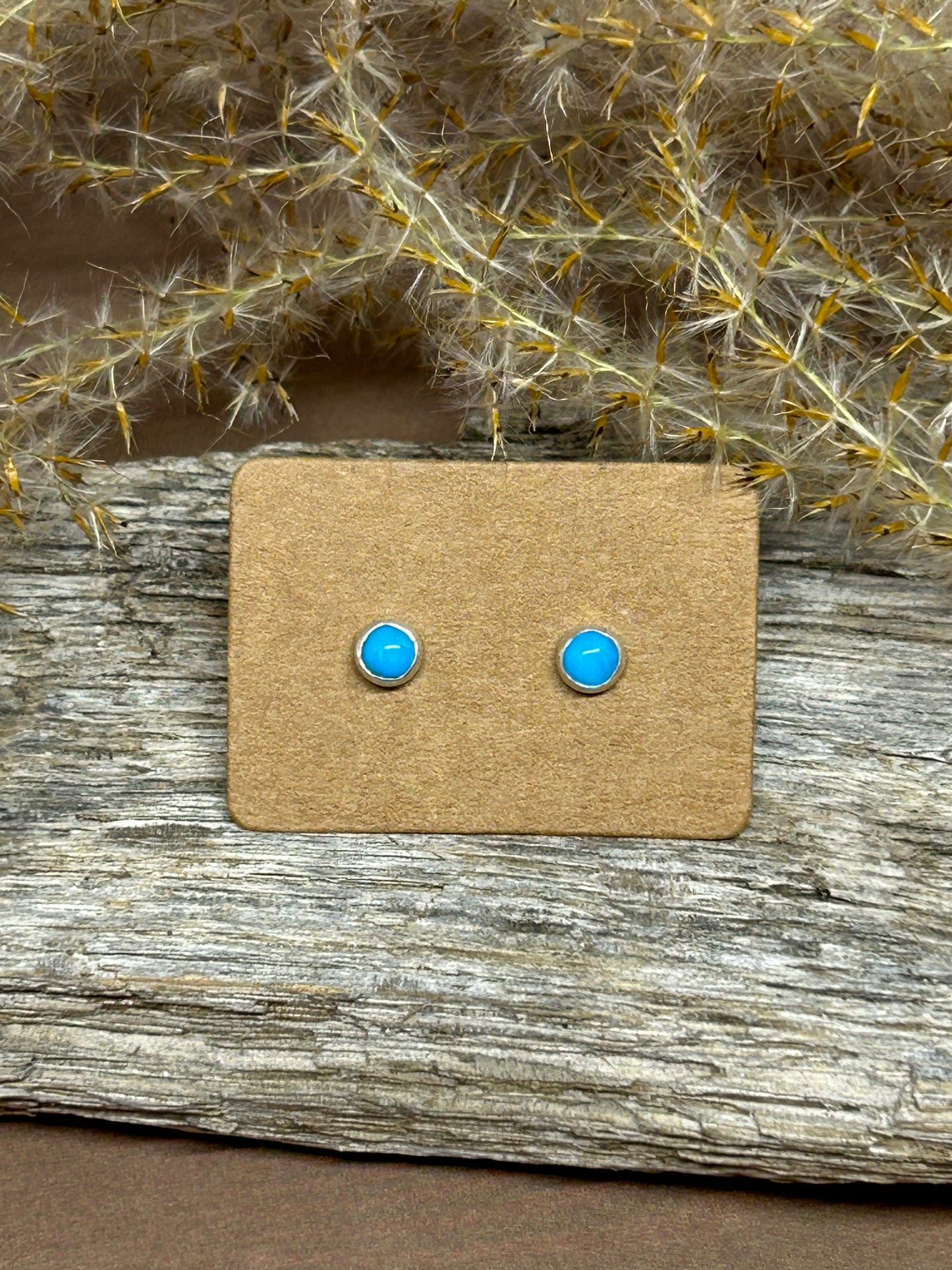 Four millimeter round blue ridge turquoise cabochons set in sterling silver with sterling posts and backs.