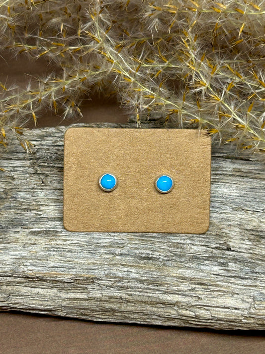 Four millimeter round blue ridge turquoise cabochons set in sterling silver with sterling posts and backs.
