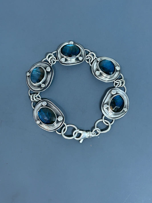 Link bracelet, five labradorite stones set in sterling silver 8 inches long with a swivel clasp.