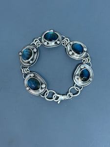 Link bracelet, five labradorite stones set in sterling silver 8 inches long with a swivel clasp.