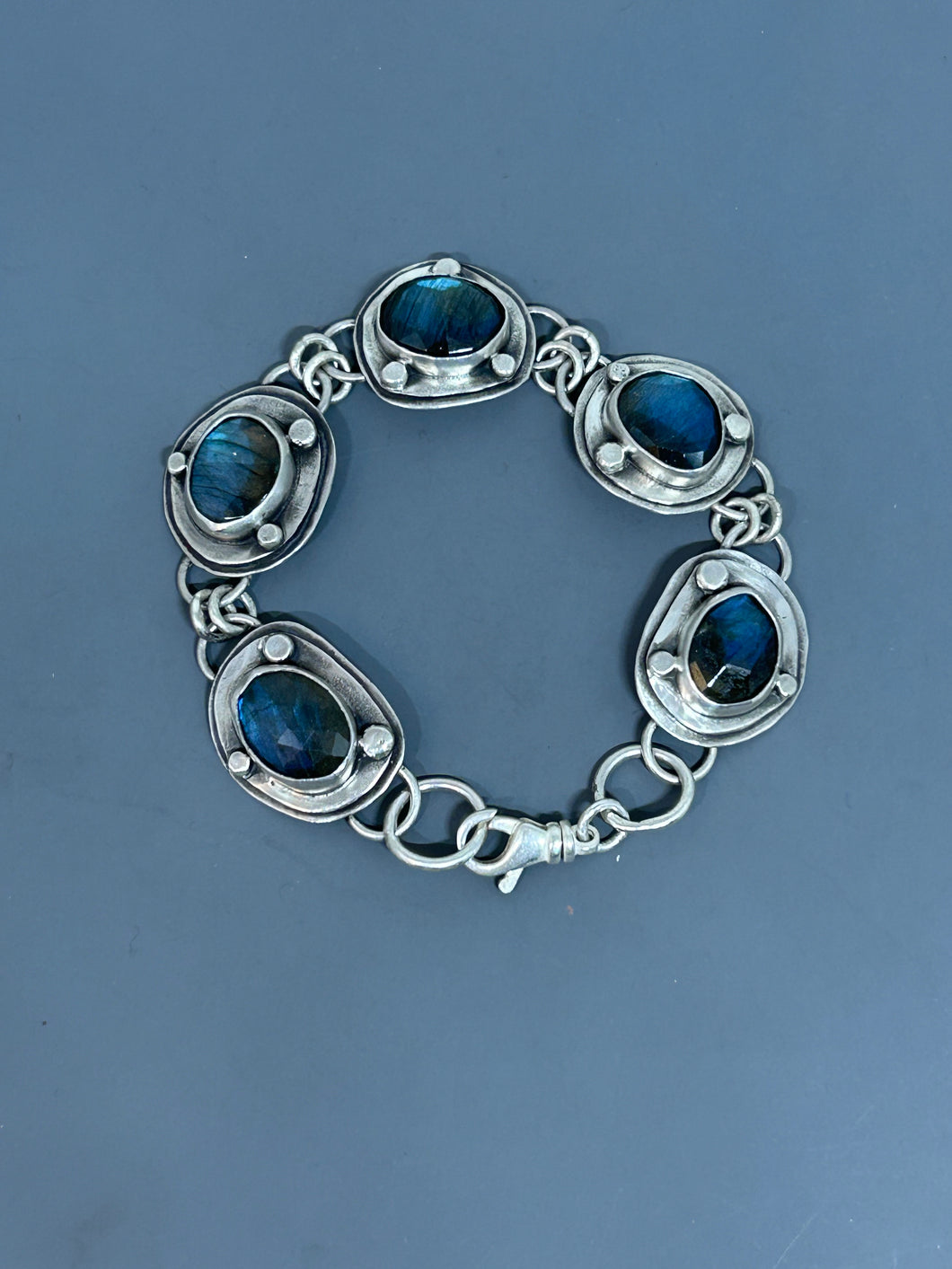 Link bracelet, five labradorite stones set in sterling silver 8 inches long with a swivel clasp.