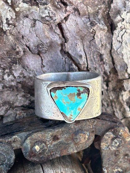 Royston turquoise set in sterling silver with a wide hammered sterling silver rustic size 8 band.