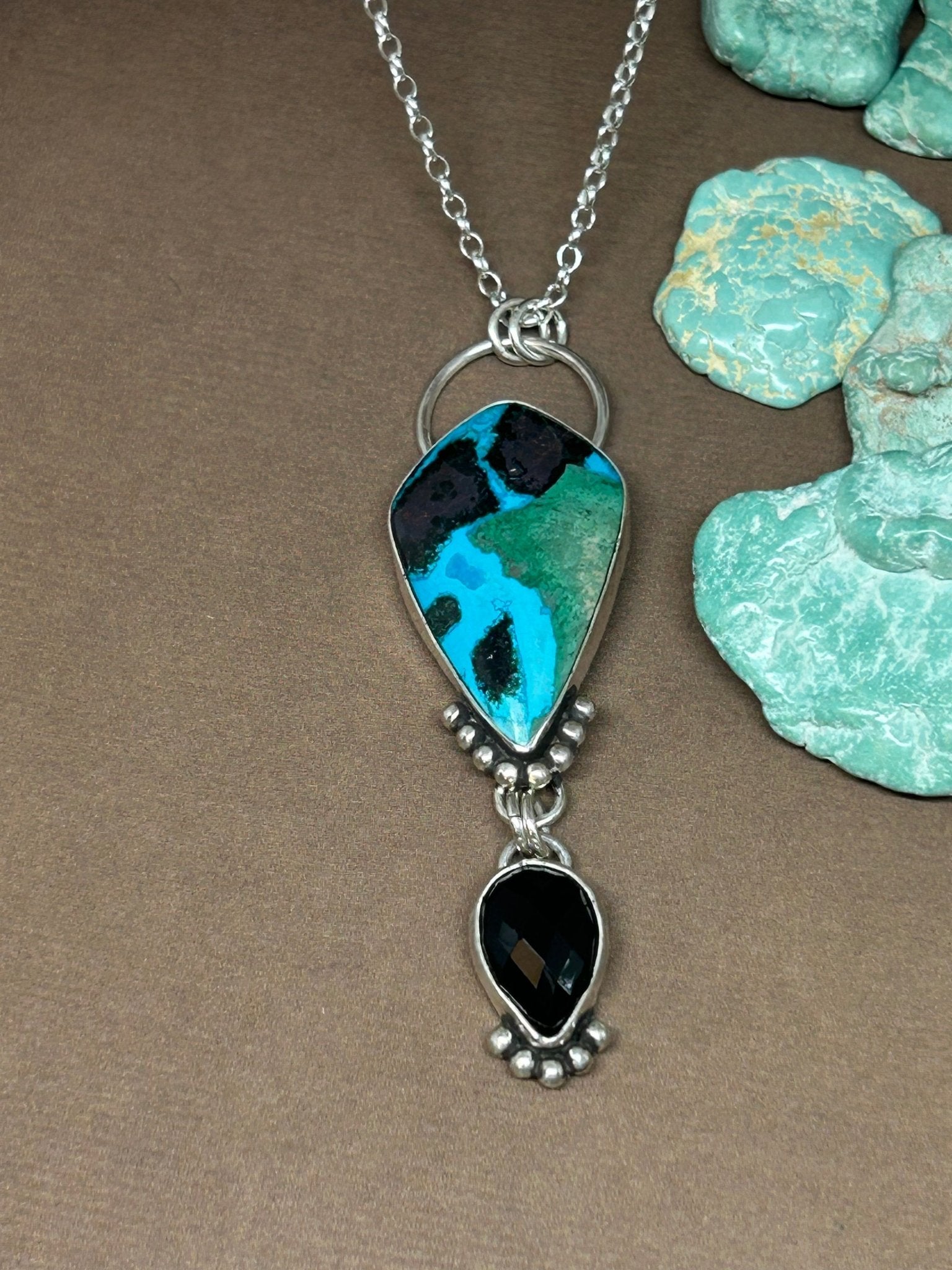 This Chrysocolla Malachite Tenorite Black Onyx necklace is a statement necklace, all stones set in sterling silver on an 18 inch sterling silver chain.