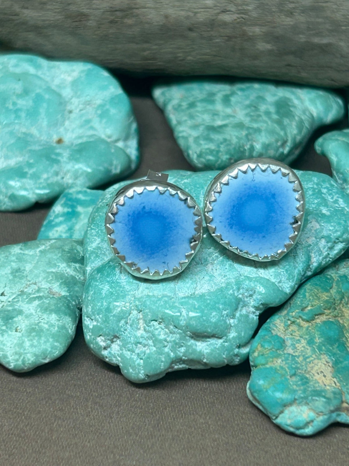 Asymmetrical round stud Golden Hills Turquoise earrings set in real sterling silver. Light blue with a darker blue inner circle.
