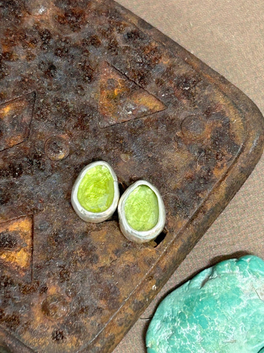 Small green Peridot stones set in sterling silver with sterling posts and backs. Lightweight for everyday.
