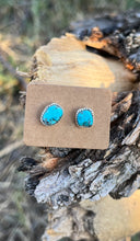 Load image into Gallery viewer, Kingman Turquoise asymmetrical stones set in sterling silver with silver posts and ear nuts, handmade by Taylor Made Silver.
