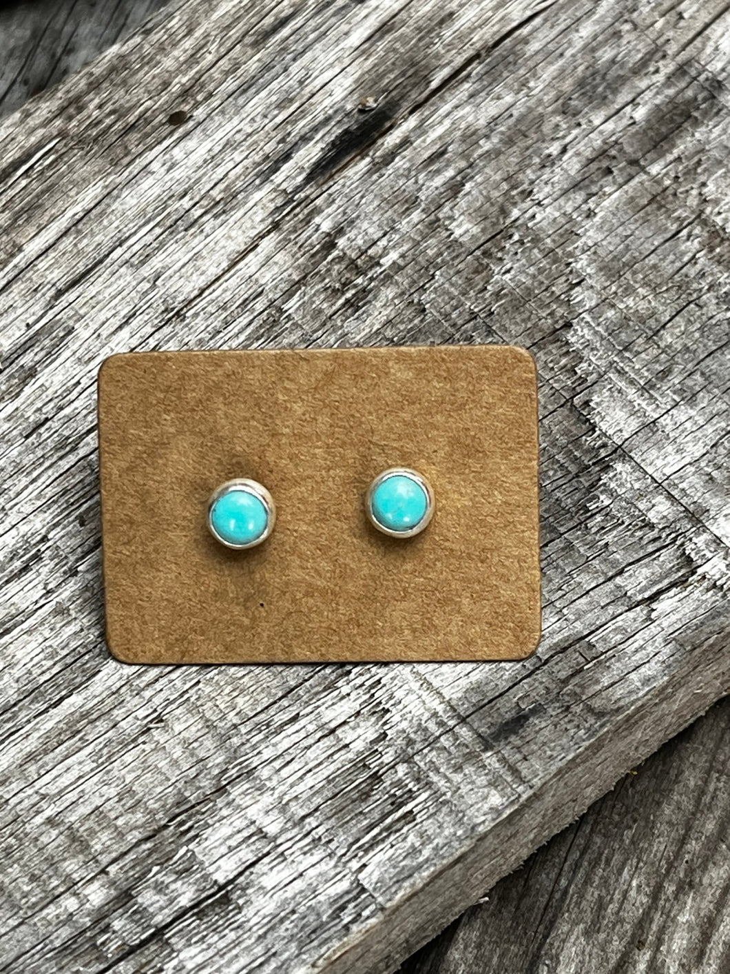 Minimalist Round turquoise set in sterling silver with silver ear nuts.